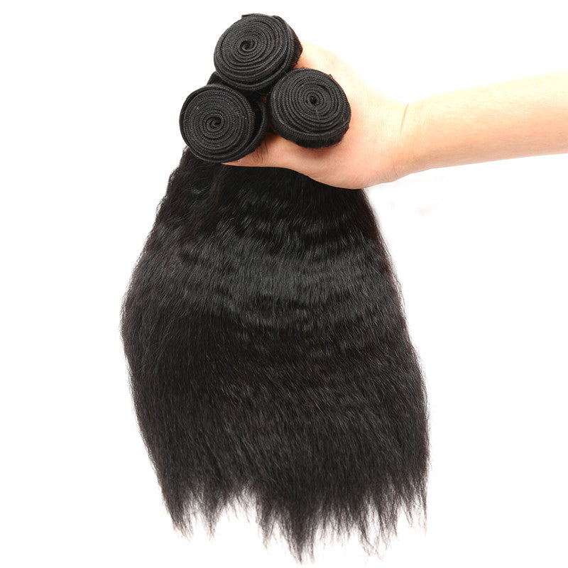 Close-up of kinky straight human hair weft texture