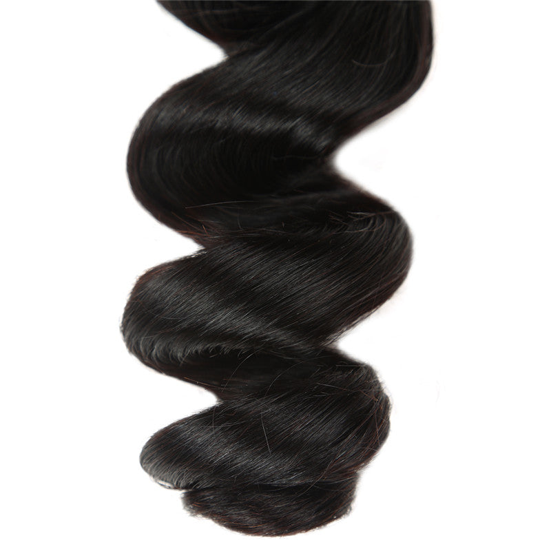 Loose wave hair bundles with soft flowing waves